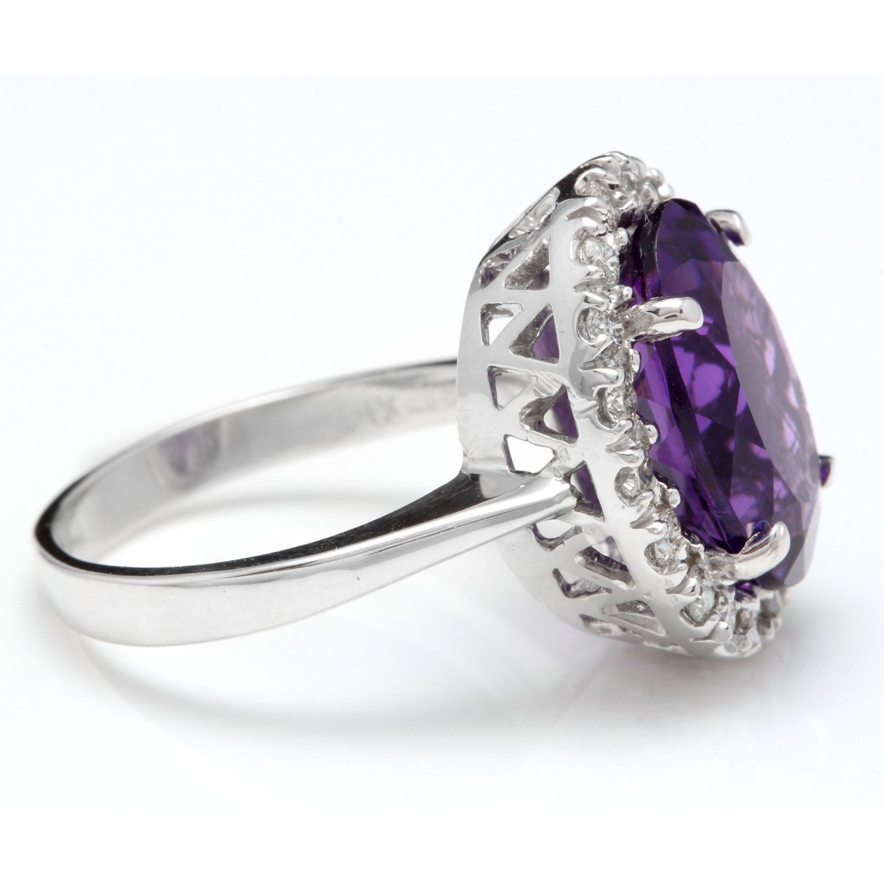 6.25 Carats Natural Amethyst and Diamond 14K Solid White Gold Ring

Total Natural Oval Amethyst Weights: Approx. 5.50 Carats

Amethyst Measures: Approx. 14.00 x 10.00mm

Natural Round Diamonds Weight: Approx. 0.75 Carats (color G-H / Clarity