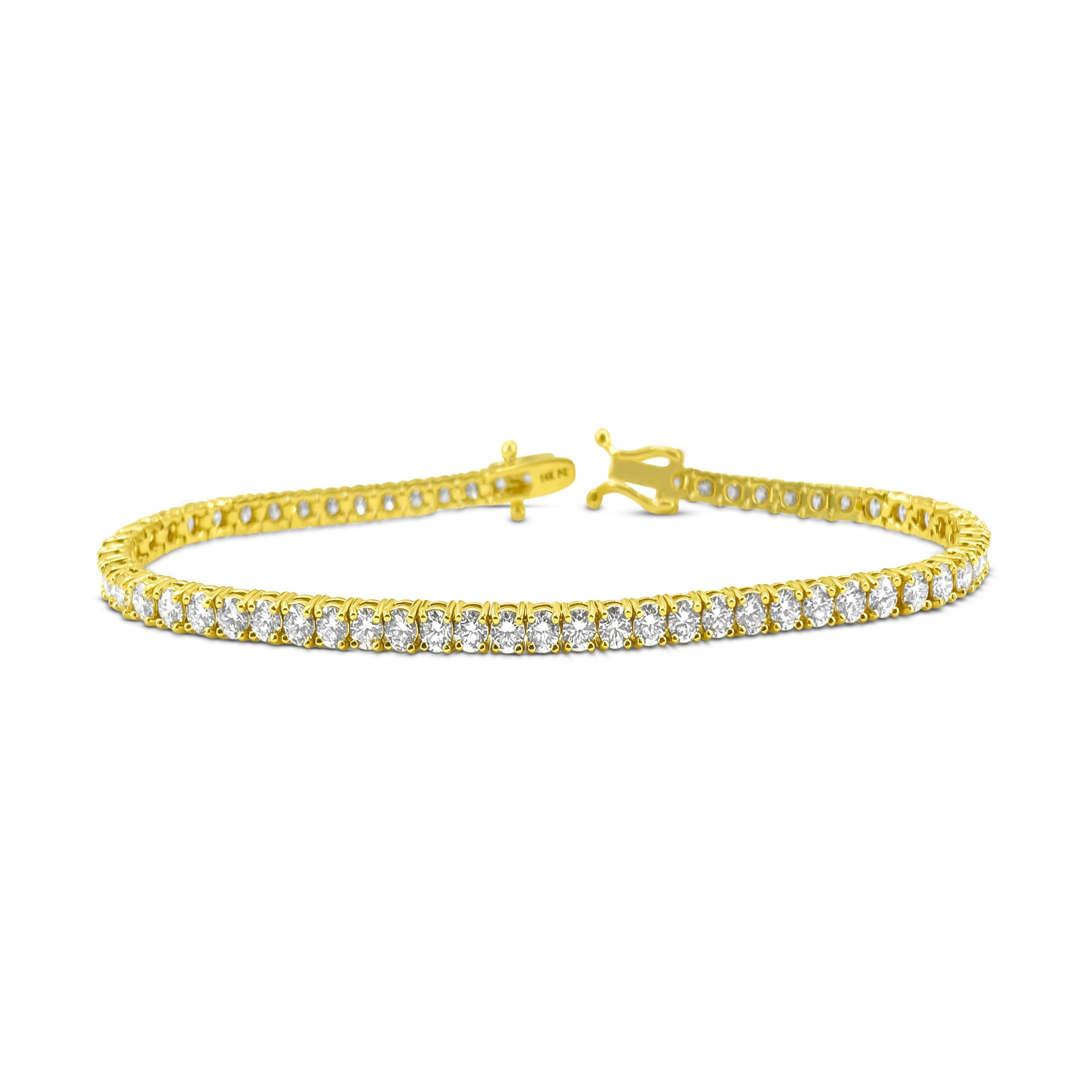 Step into elegance with our Unisex Diamond Tennis Bracelet, crafted from radiant 14k yellow gold. Adorned with a dazzling 6.25 carats of round brilliant cut diamonds, each boasting VVS clarity and H-I color, this bracelet exudes timeless