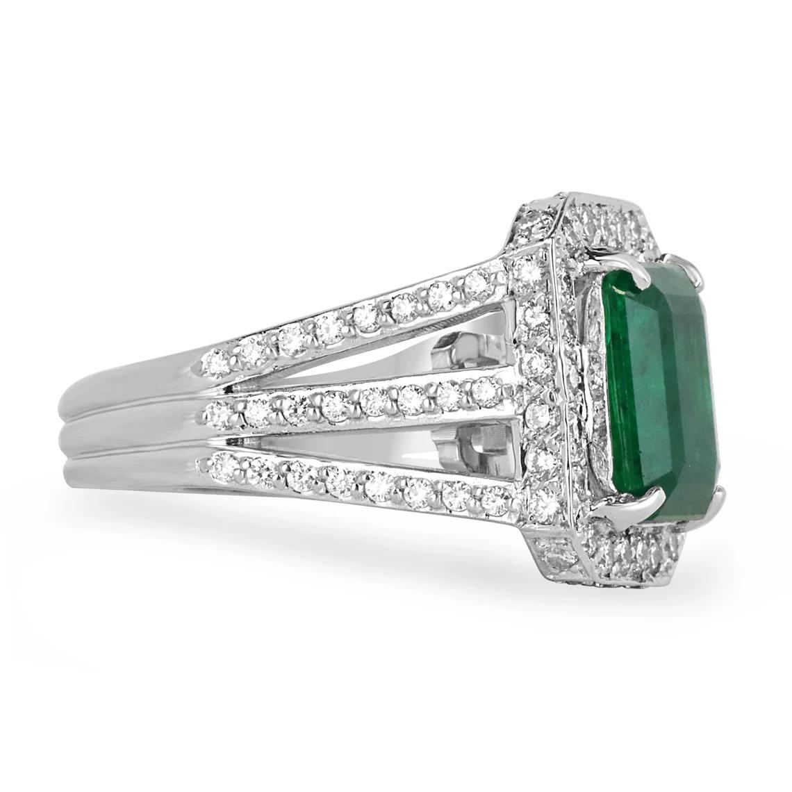 A luxurious emerald and diamond cocktail ring. This remarkable masterpiece features a large, fine-quality natural emerald cut emerald from the origin of Zambia. The gemstone showcases a rich dark emerald-green color, excellent-very good clarity,