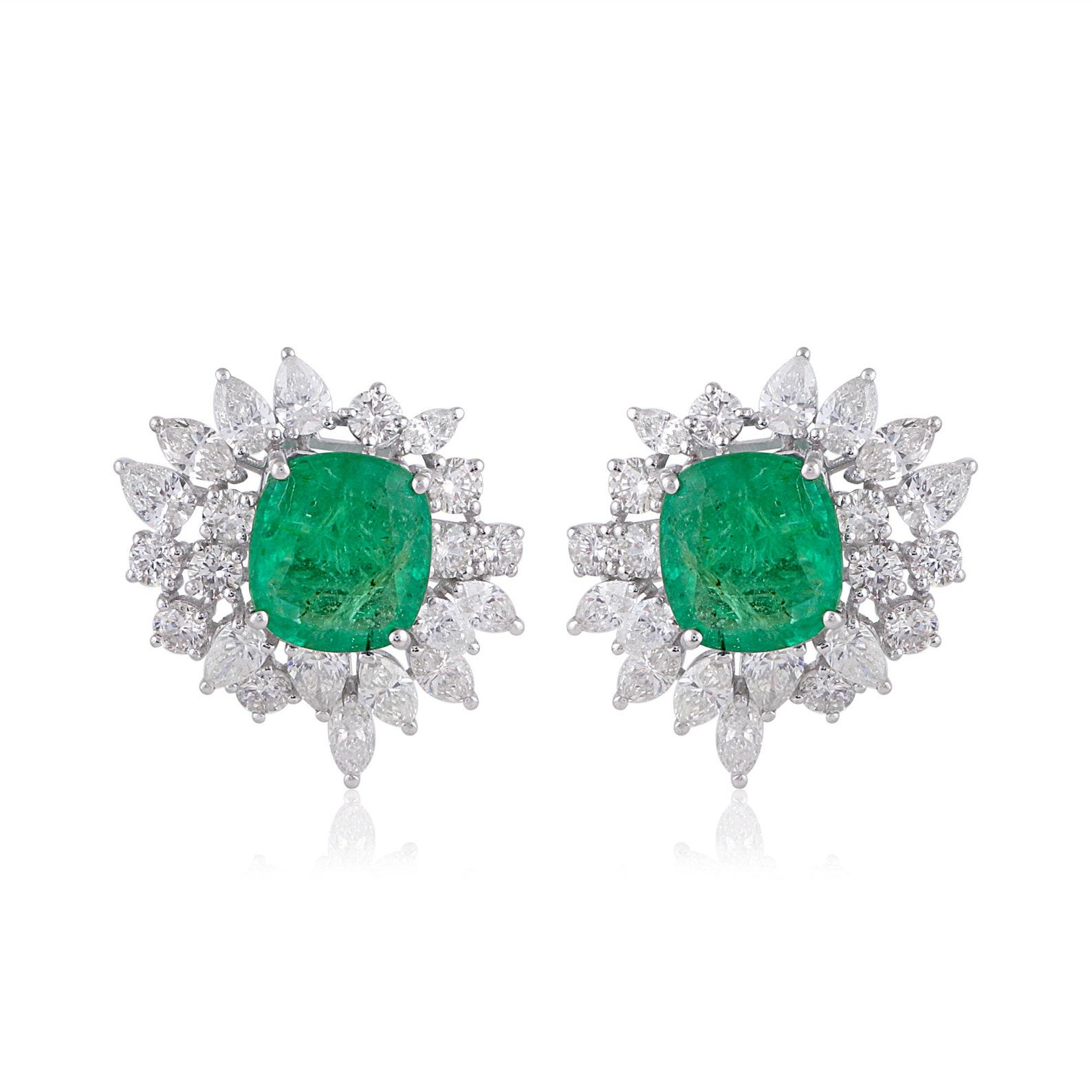 Cast in 14 karat gold, these stunning stud earrings are hand set with 6.26 carats emerald and 4.70 carats of glimmering diamonds. 

FOLLOW MEGHNA JEWELS storefront to view the latest collection & exclusive pieces. Meghna Jewels is proudly rated as a