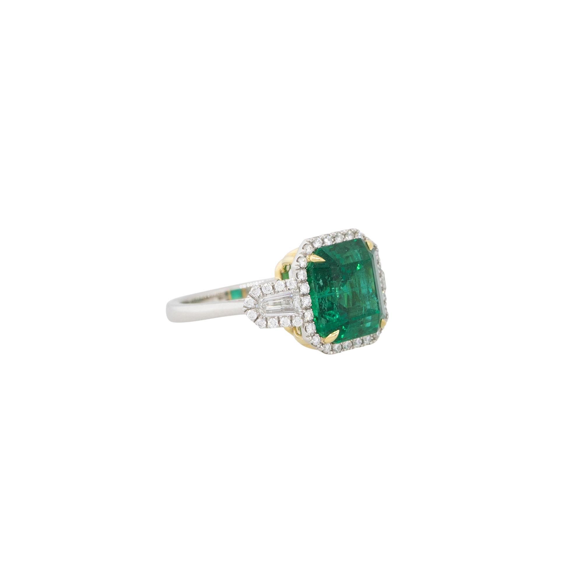 Emerald Cut 6.26 Carat Emerald and Diamond Halo Ring Platinum and 18 Karat In Stock For Sale