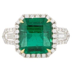 6.26 Carat Emerald and Diamond Halo Ring Platinum and 18 Karat In Stock