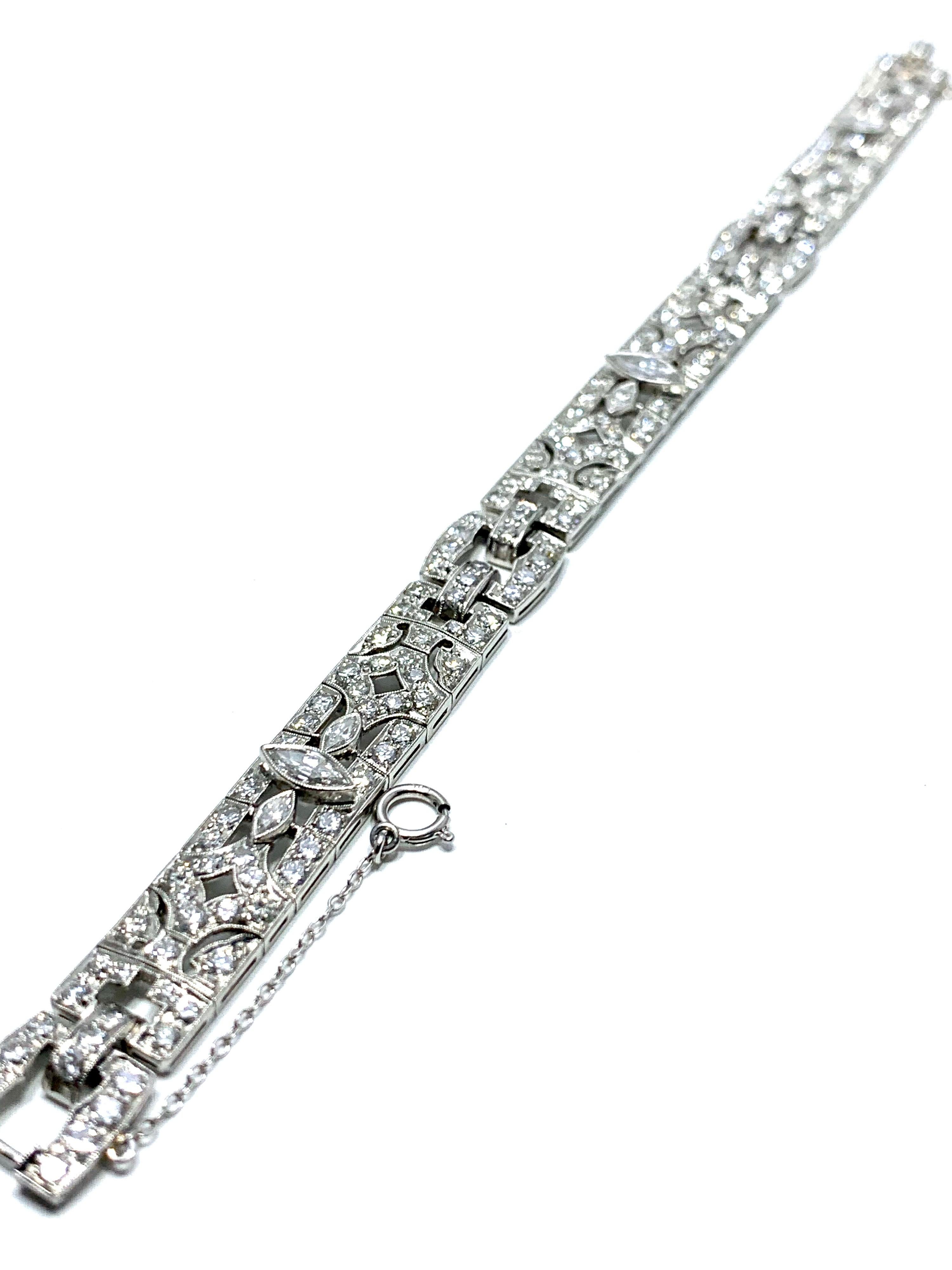 A beautiful Art Deco Style Diamond and platinum bracelet.  The 6.26 carats in Diamonds is made up of round and marquise cuts, set in handcrafted milgrain edged platinum links.  The Diamonds are G-H color, and VS clarity.  The bracelet is 7.50 inches
