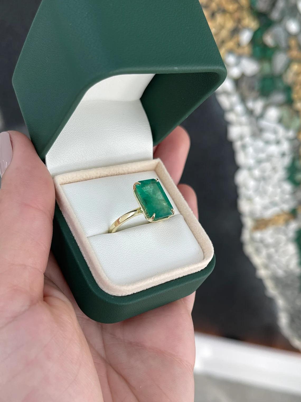 6.26ct 18K Large Dark Mossy Green Emerald Cut Emerald 4 Prong Solitaire Ring In New Condition For Sale In Jupiter, FL