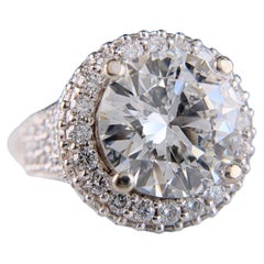 Impresionante anillo con un diamante redondo brillante de 6,27 ct engastado en oro blanco de 14k