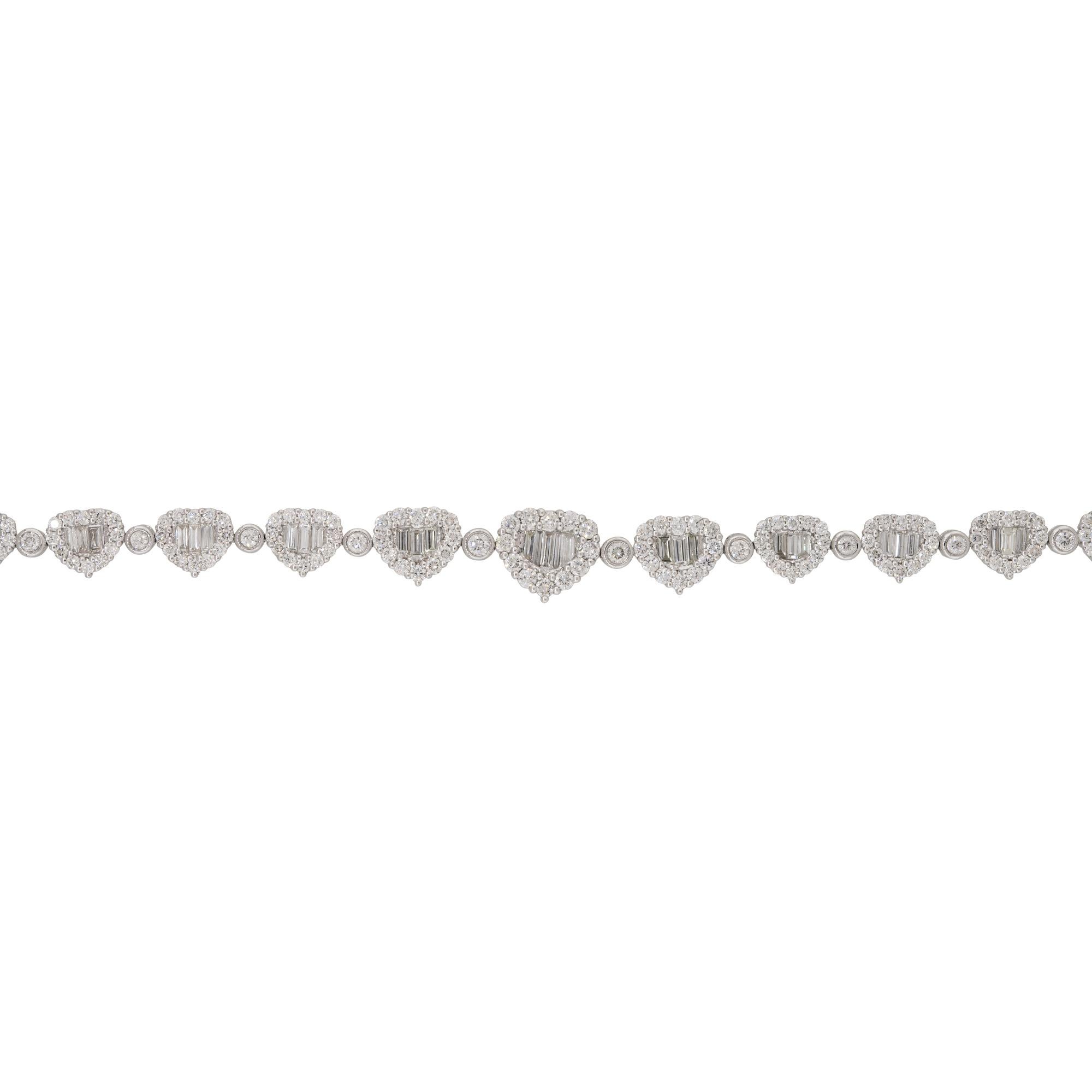 18k White Gold 6.27ctw Pave Diamond Heart Shaped Station Bracelet

Product: Pave Diamond Heart Shaped Station Bracelet
Material: 18 Karat White Gold
Diamond Details: There are approximately 2.19 carats of Baguette cut  diamonds (41 stones) and