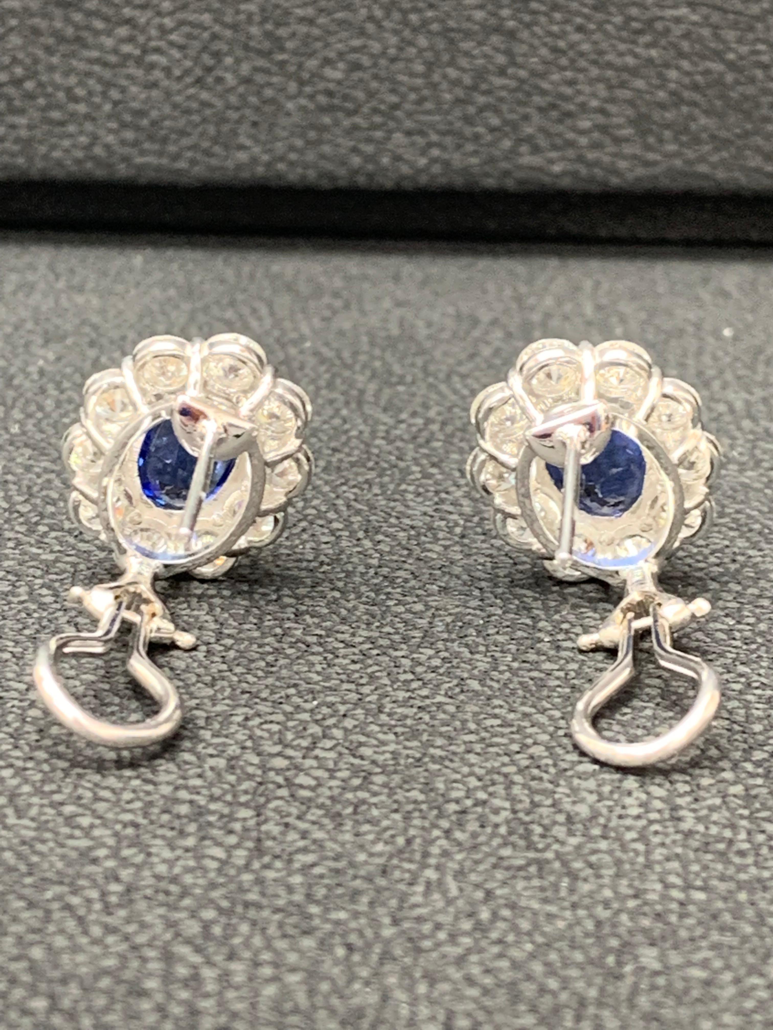 Women's 6.28 Carat Oval Cut Blue Sapphire and Diamond Halo Earrings in 18K White Gold For Sale