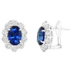 6.28 Carat Oval Cut Blue Sapphire and Diamond Halo Earrings in 18K White Gold