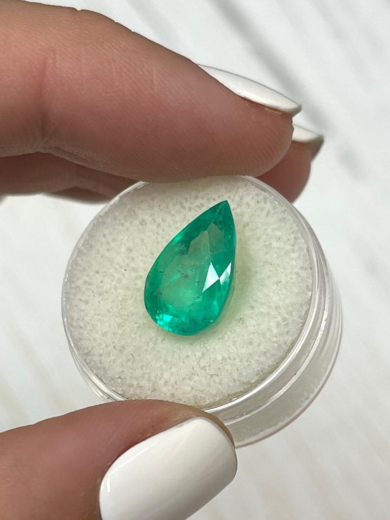Modern 6.28 Carat Yellowish Muzo Green Colombian Emerald - Pear-Cut May Birthstone For Sale