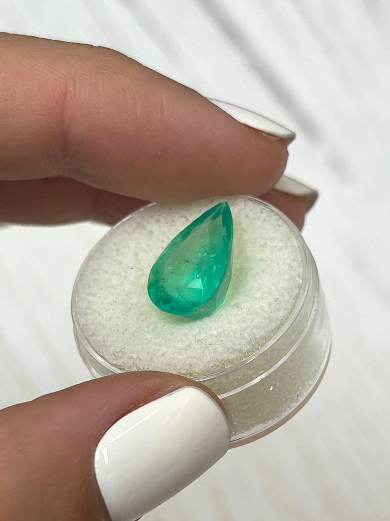 Pear Cut 6.28 Carat Yellowish Muzo Green Colombian Emerald - Pear-Cut May Birthstone For Sale