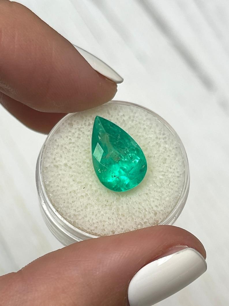 6.28 Carat Yellowish Muzo Green Colombian Emerald - Pear-Cut May Birthstone In New Condition For Sale In Jupiter, FL