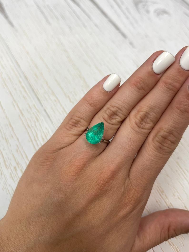 6.28 Carat Yellowish Muzo Green Colombian Emerald - Pear-Cut May Birthstone For Sale 2