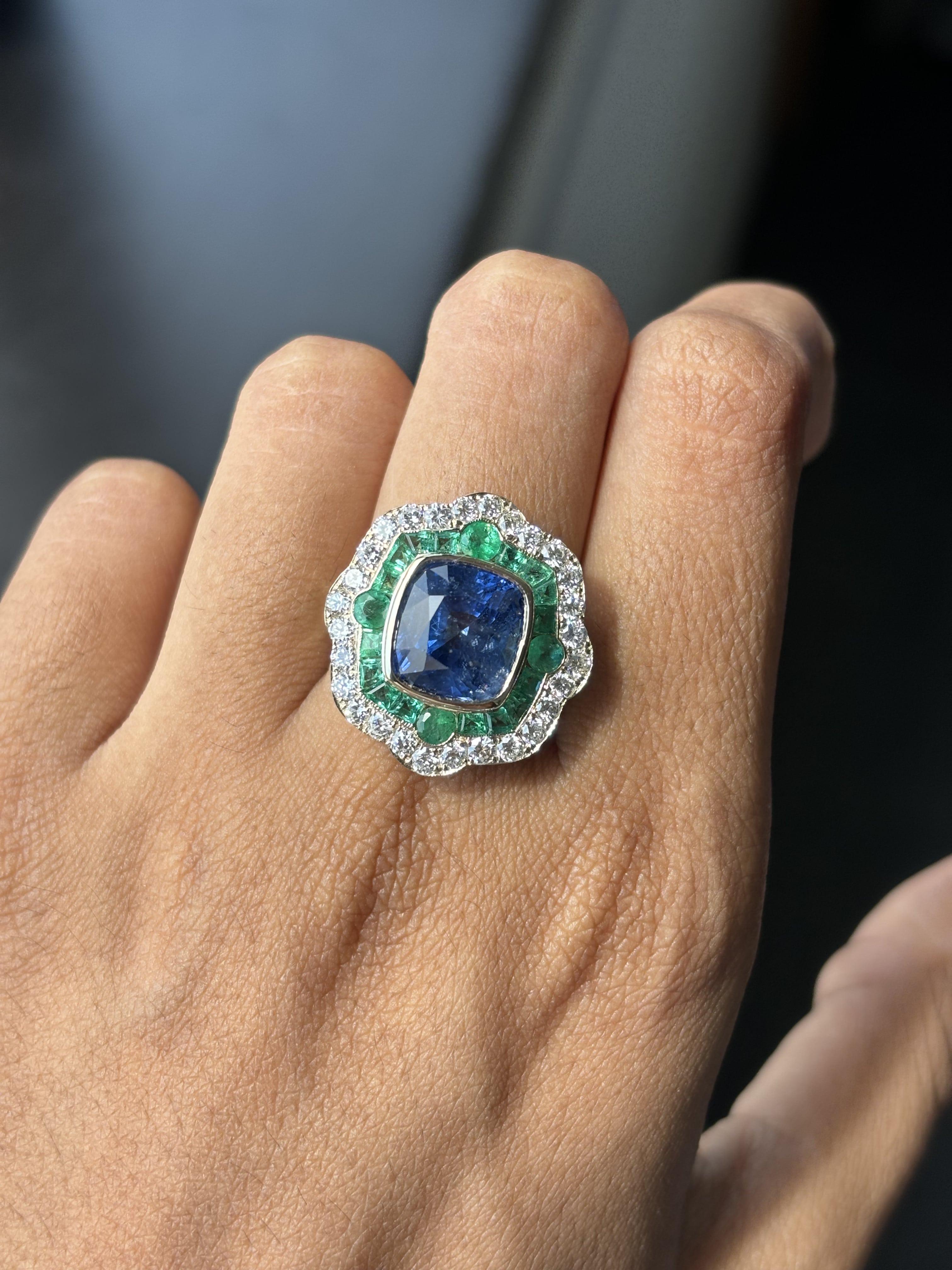 6.28ct Cornflower Blue Sapphire, 1.60ct Emerald, 1.02ct Diamond 18K Gold Ring 7