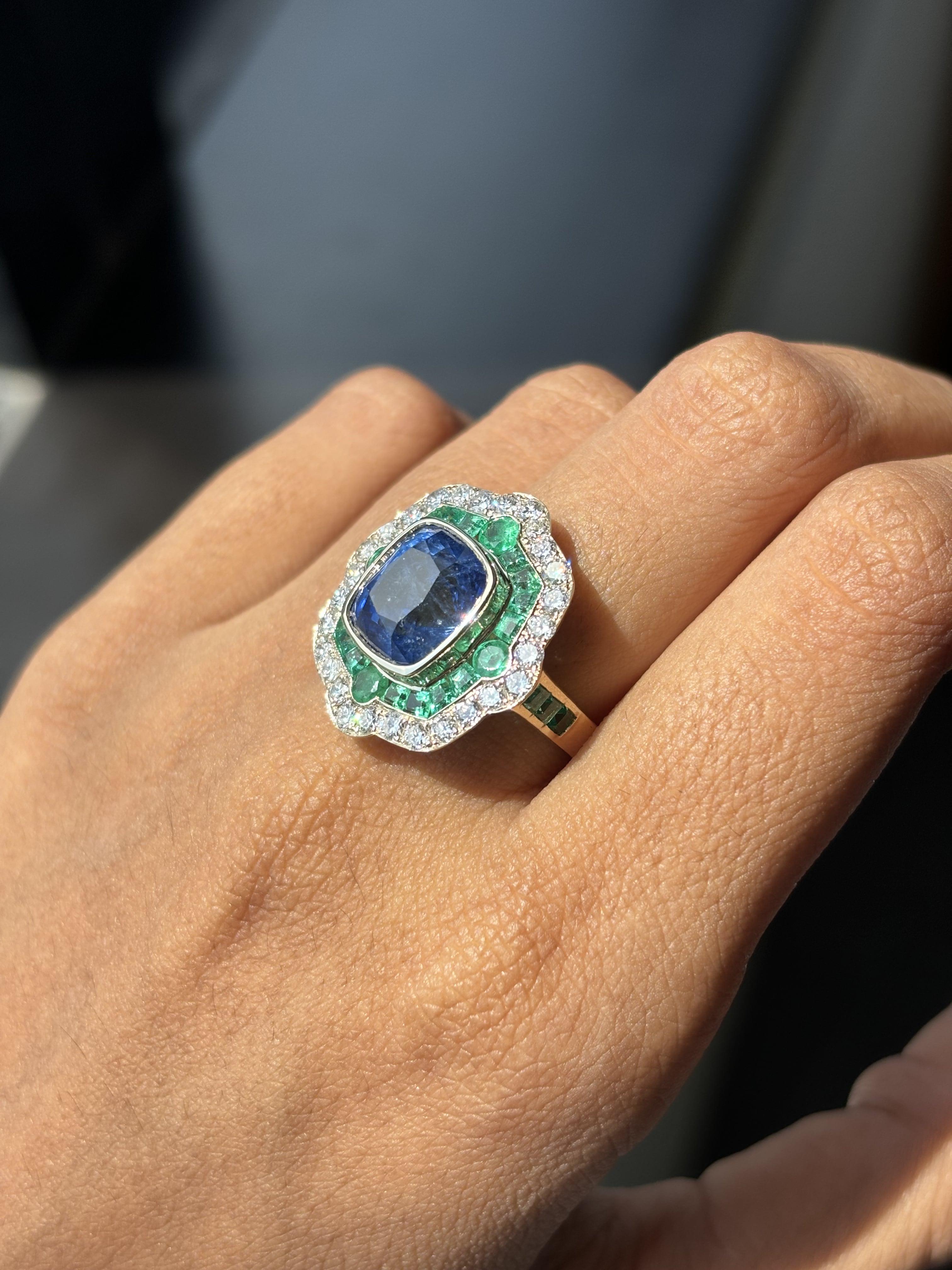 6.28ct Cornflower Blue Sapphire, 1.60ct Emerald, 1.02ct Diamond 18K Gold Ring 1