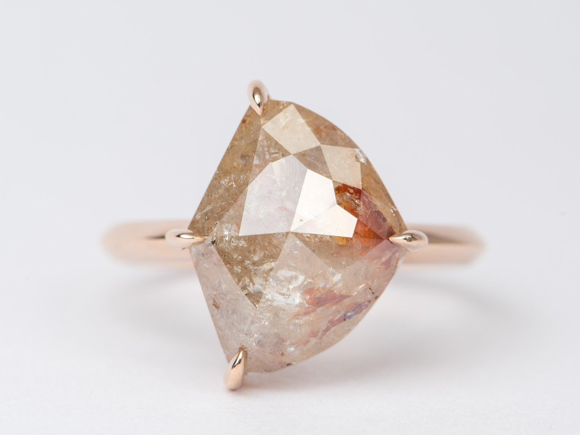 ♥ Solid 14K rose gold ring set with a geometric-shaped Koi Fish diamond
♥ This stunning diamond has excellent transparency with coral/orange color inclusions and is held with claw prongs
♥ The overall setting measures 16.2mm in width, 12.7mm in