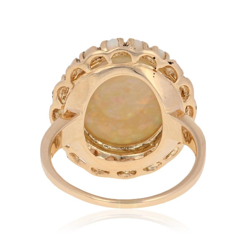 6.29 Carat Oval Cabochon Cut Opal Vintage Ring, 14 Karat Yellow Gold Halo In Excellent Condition In Greensboro, NC