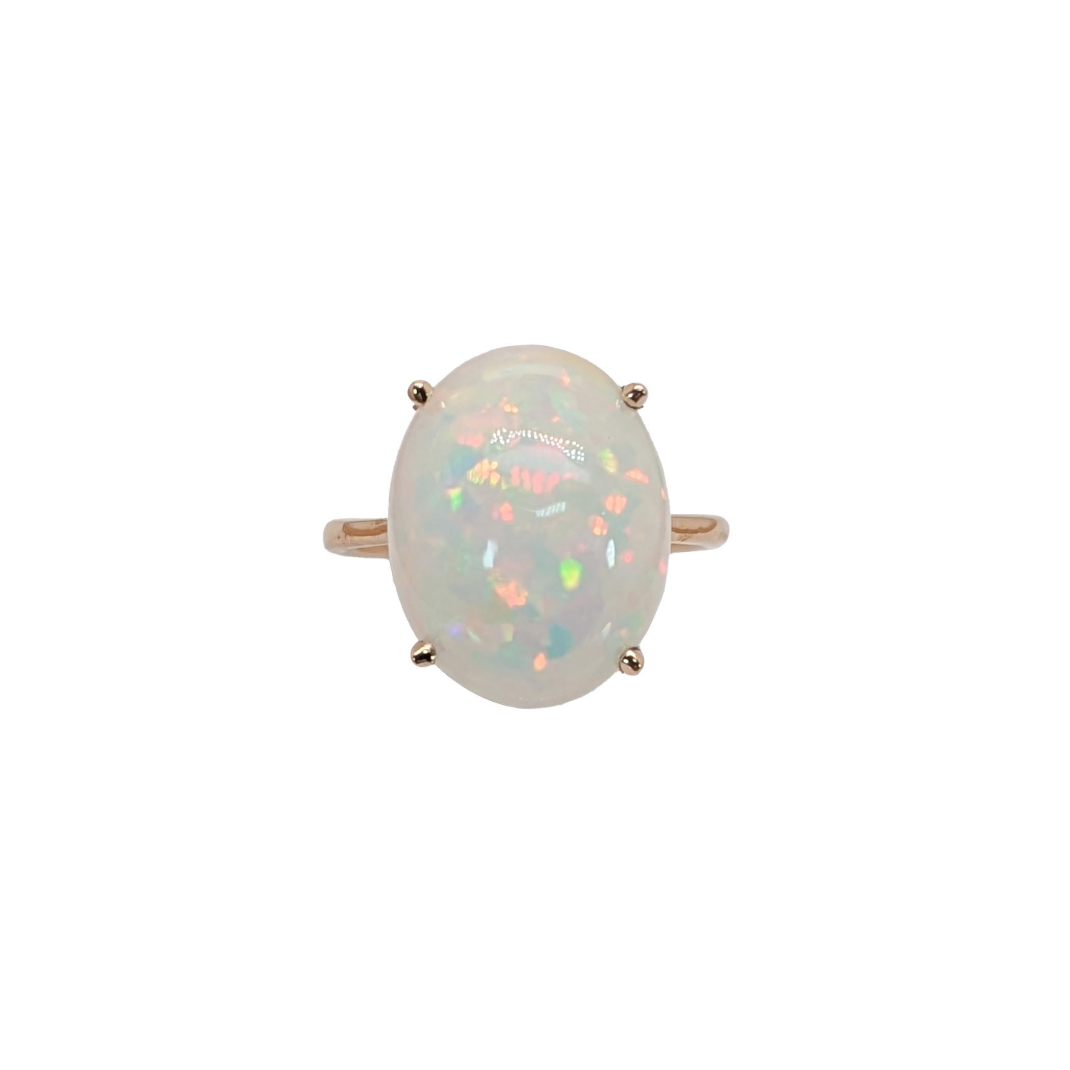 Cette magnifique bague est ornée d'un solitaire en opale de 6,19 carats serti dans de l'or jaune 14K massif. Cette bague en Opale est un magnifique cadeau pour vos proches, en tant que pierre de naissance du mois d'octobre !

**Nous offrons un