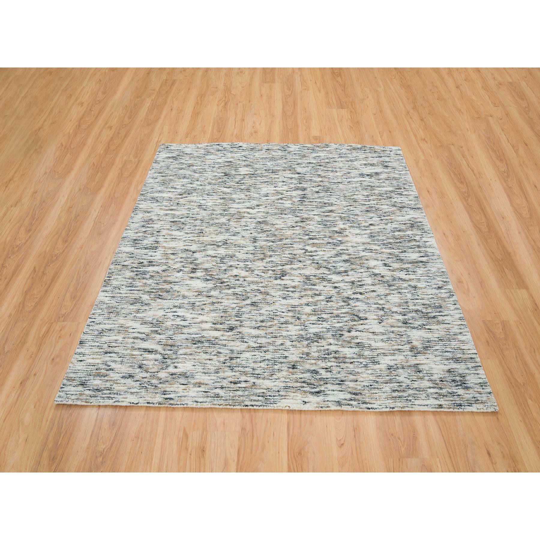 Erdtöne, handgewebtes modernes Streifendesign, weiche, reine Wolle, quadratischer Orientteppich
Primäre MATERIALIEN: Wolle
Latex: Kein Flor 
Höhe: 0,25 Zoll
Stil: Transitional
Grundfarbe: Beige
Sekundäre Farben: Schwarz, Elfenbein, Braun,