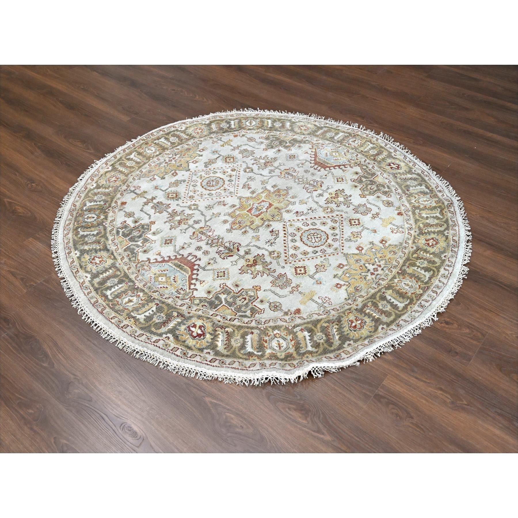 Goose Gray, Karajeh Design with Tribal Medallions, Pure Wool, Hand Knotted, Round Oriental Rug
Primary materials: Wool
Latex: No Pile 
height: 0.25 Inches
Style: Traditional
Primary color: Grey
Secondary colors: Rust Red, Alice Blue, Goldenrod,