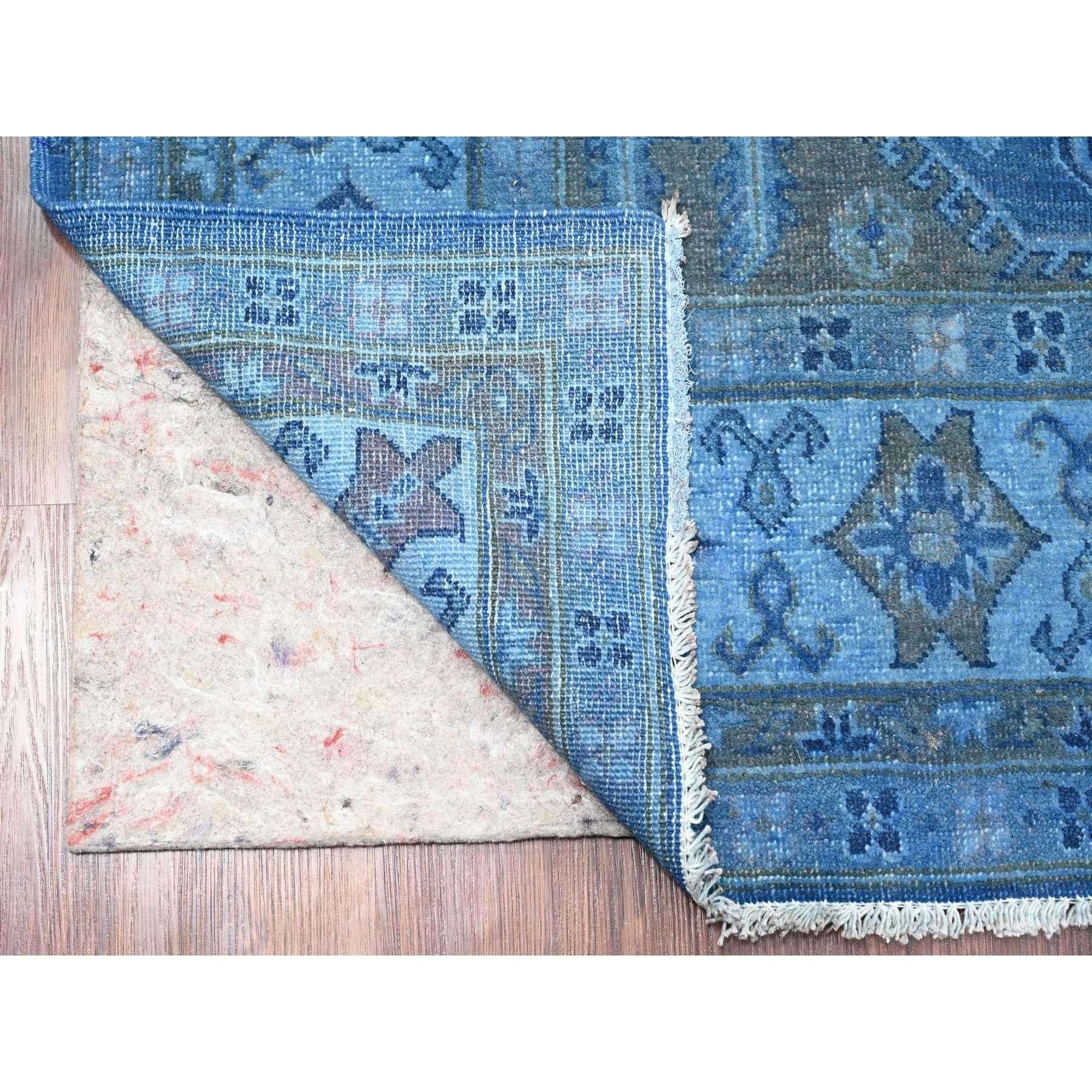 Cerulean Blue, Overdyed Kazak with Star Medallion Design, Hand Knotted, 100% Wool, Oriental Rug
Primary materials: Wool
Latex: No Pile 
height: 0.25 Inches
Style: Traditional
Primary color: Blue
Secondary colors: None
Pattern: Oriental