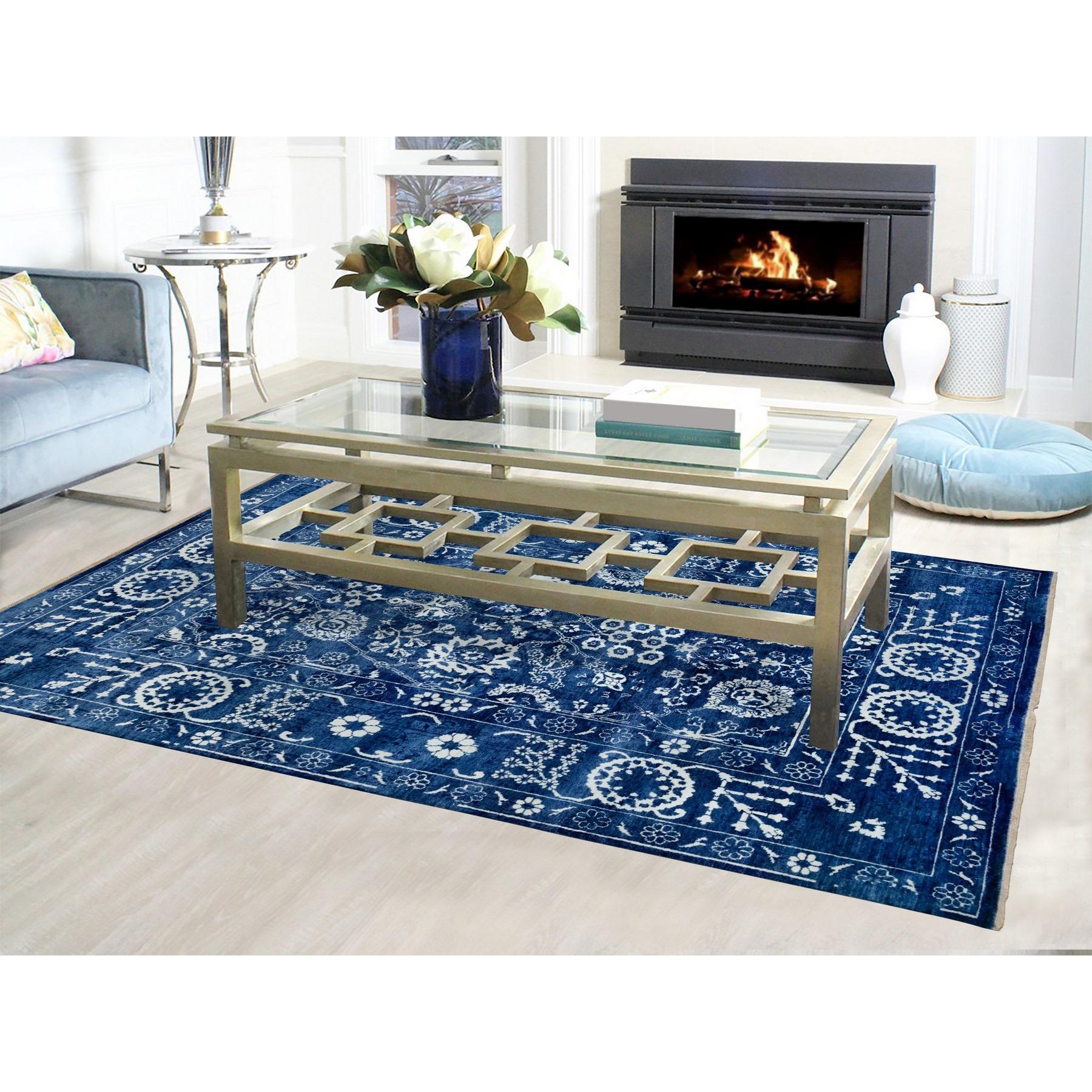 This is a truly genuine one-of-a-kind Blue Hand Knotted Tone On Tone Tabriz Wool and Silk Oriental Rug. It has been woven for months and months in the centuries-old Persian weaving craftsmanship techniques by expert artisans.
Primary materials: Wool