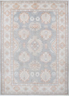 6.2x9 ft Handknotted Light Blue, Beige Rug with Soft Peach Geometric Motifs