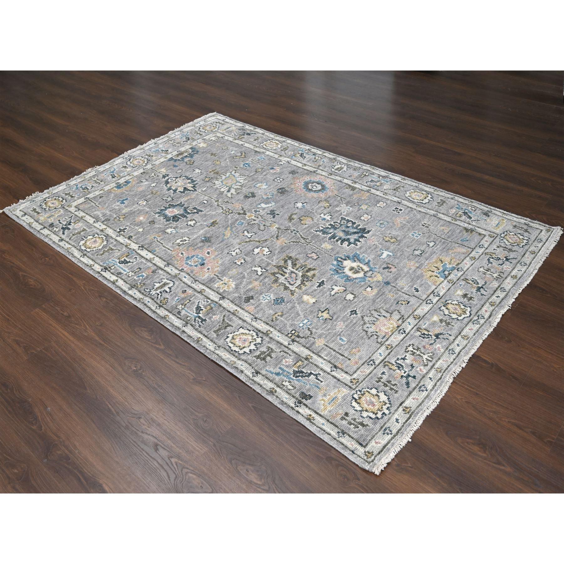 Gray with Pop of Color, Oushak Design, Plush and Lush Supple Collection, Soft Wool Hand Knotted, Oriental Rug
Primary materials: Wool
Latex: No Pile 
height: 0.25 Inches
Style: Transitional
Primary color: Grey
Secondary colors: Red, Yellow, Green,