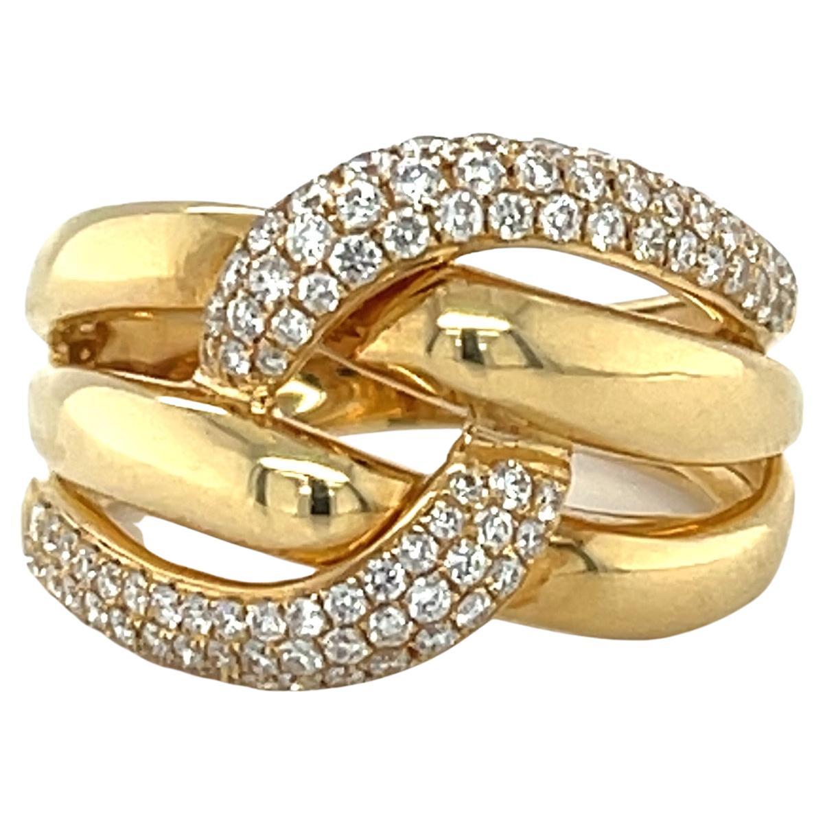 Sparkly round brilliant cut diamonds weighing a total of .63 carats are pave set in this ring. It is a modern take on a classic woven knot design. So pretty and wearable! Make this one your signature piece. Made of 18k yellow gold.

Ring Size: