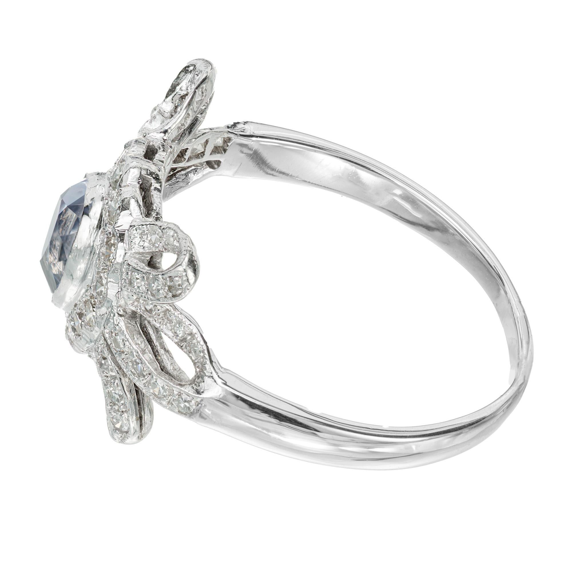 Pear Cut .63 Carat Periwinkle Blue Sapphire Platinum Bow Art Deco Ring For Sale