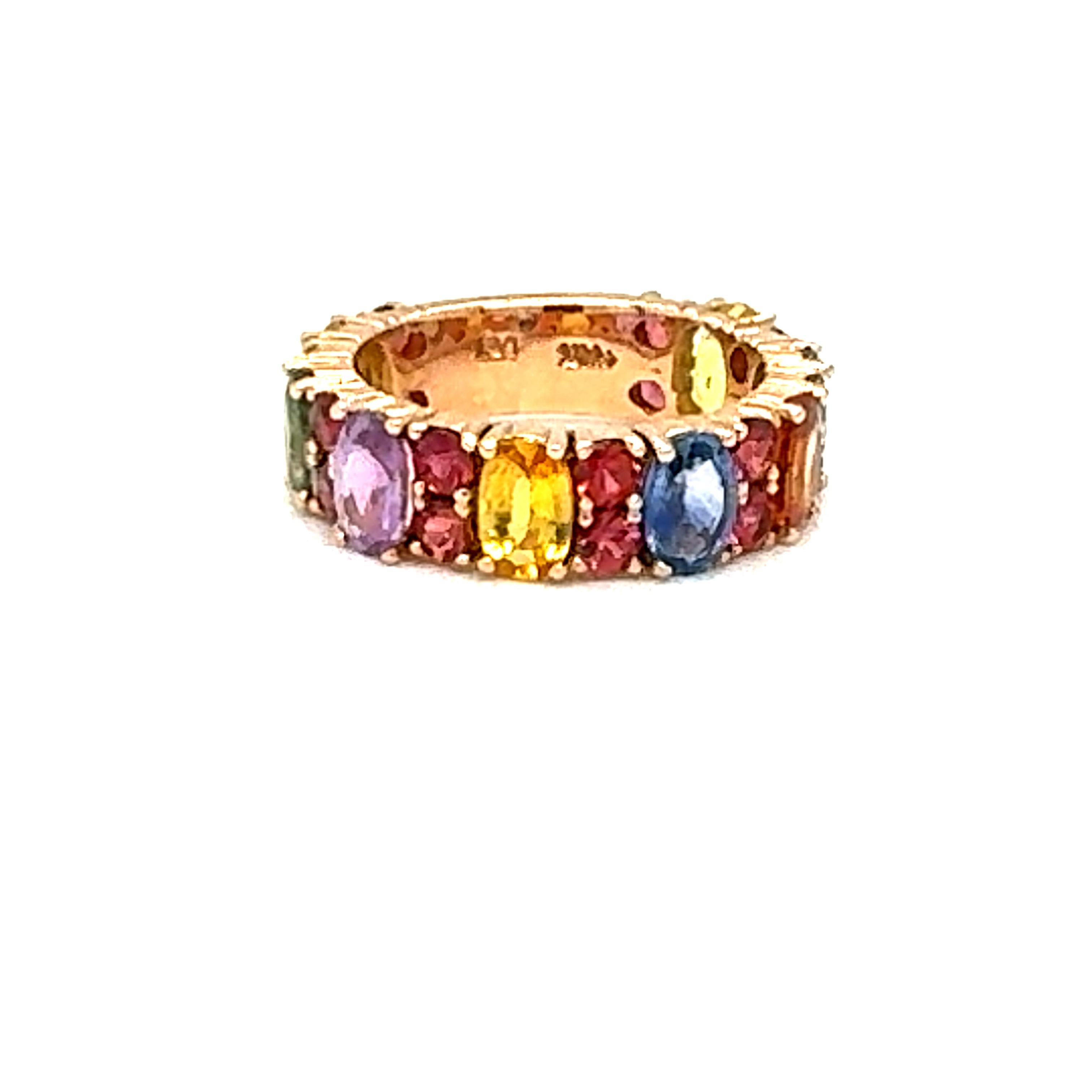 6.30 Carat Multi-Color Sapphire Rose Gold Band

There are 24 Multi-color Natural Oval and Round Cut Sapphires in this band that weigh 6.30 Carats.  It is made in 14K Rose Gold and weighs approximately 4.8 Grams.

The band is a size 7 and can be