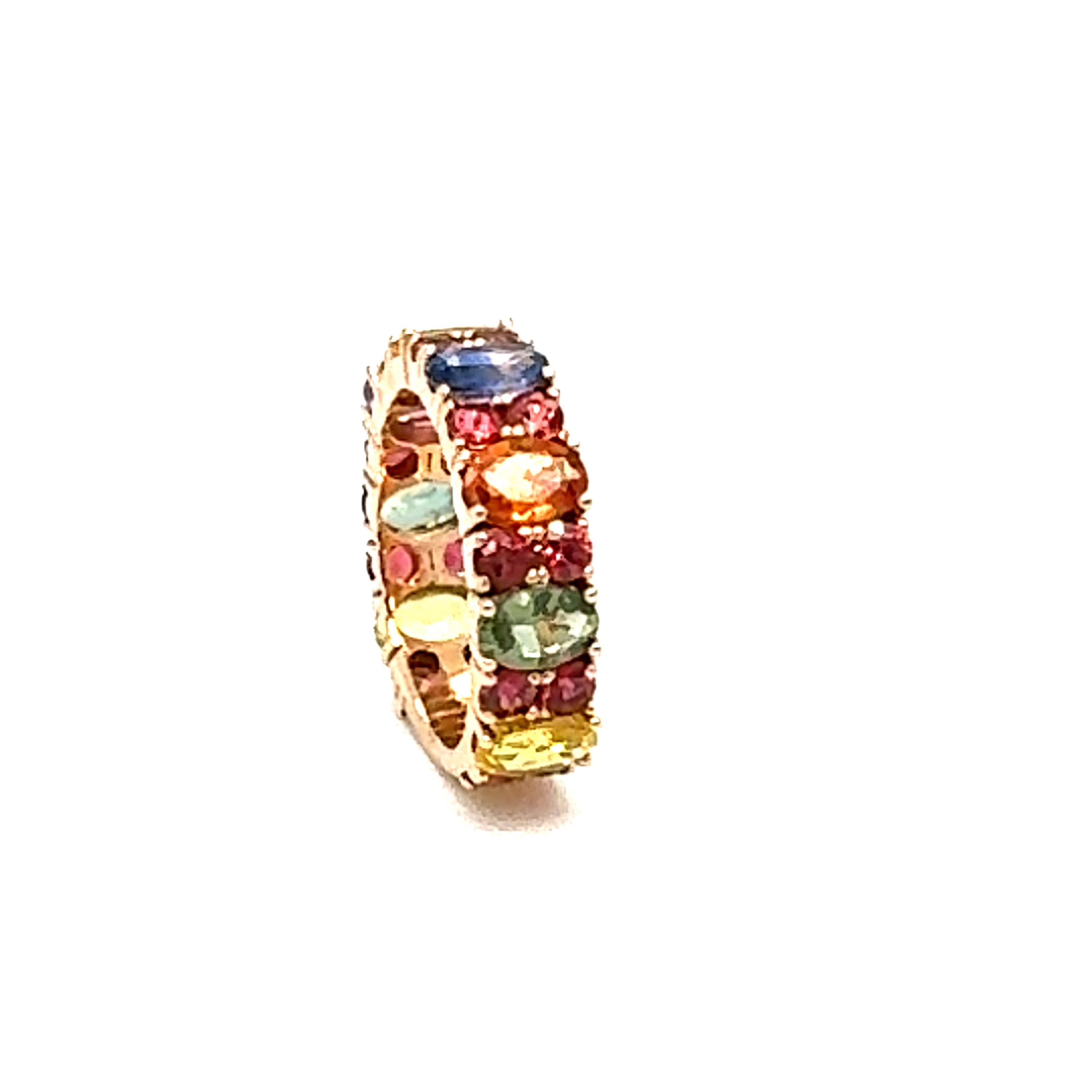 Oval Cut 6.30 Carat Multi-Color Sapphire Rose Gold Band For Sale