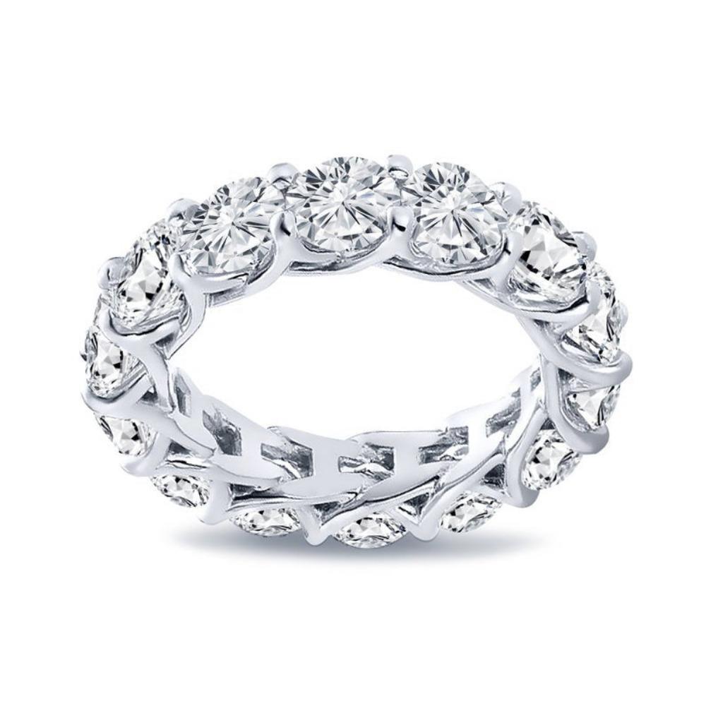 For Sale:  6.30 Carat Round Cut Eternity Band Shared Prong in Yellow Gold G, SI2 2