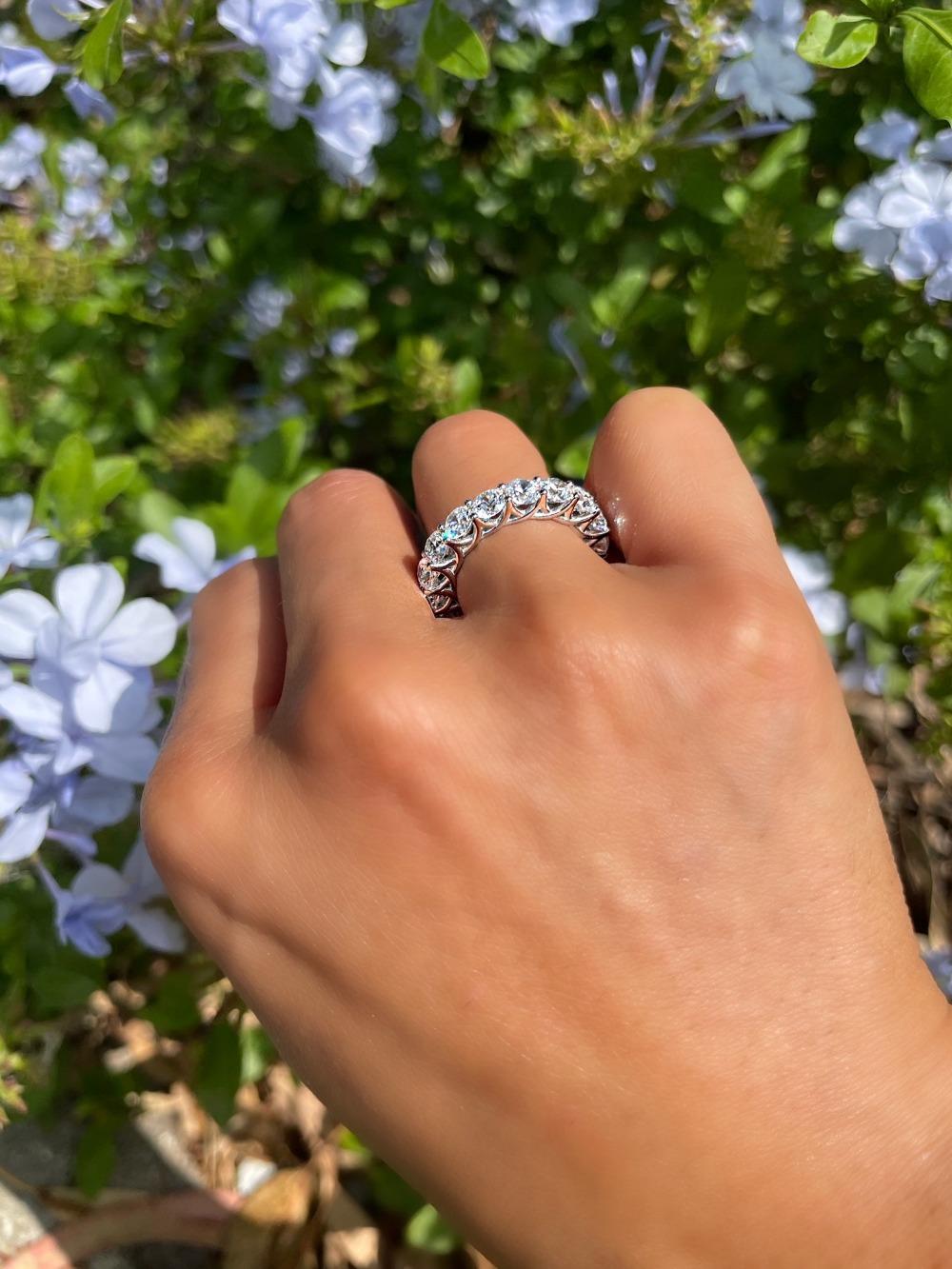 For Sale:  6.30 Carat Round Cut Eternity Band Shared Prong in Yellow Gold G, SI2 5