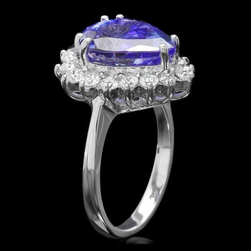 6.30 Carats Natural Tanzanite and Diamond 14K Solid White Gold Ring

Total Natural Tanzanite Weight is: Approx. 5.40 Carats 

Tanzanite Measures: Approx. 13.00 x 10.00mm

Natural Round Diamonds Weight: Approx. 0.90 Carats (color G-H / Clarity