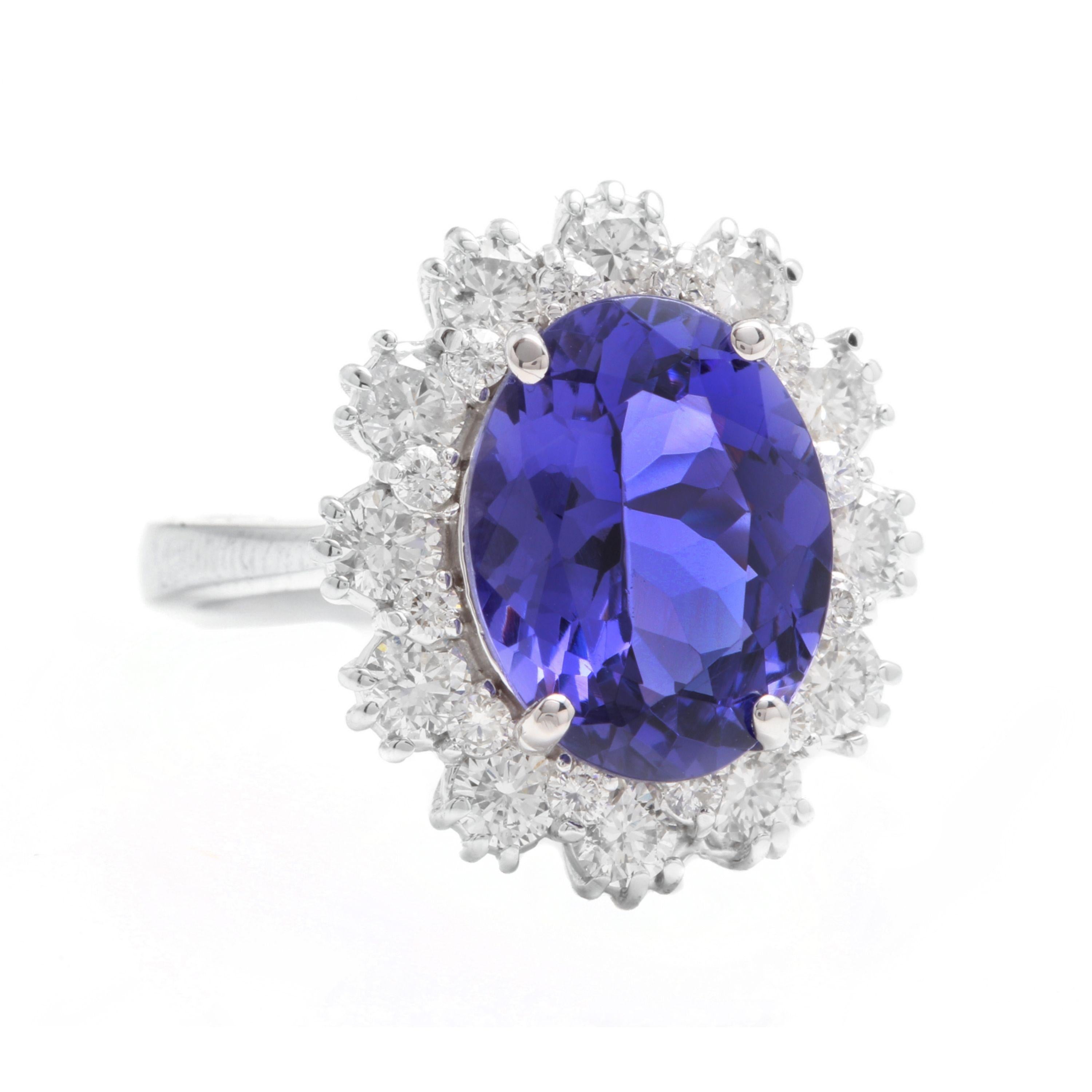 6.30 Carats Natural Very Nice Looking Tanzanite and Diamond 14K Solid White Gold Ring

Total Natural Oval Cut Tanzanite Weight is: Approx. 5.20 Carats

Natural Round Diamonds Weight: Approx. 1.10 Carats (color G-H / Clarity SI1-SI2)

Tanzanite