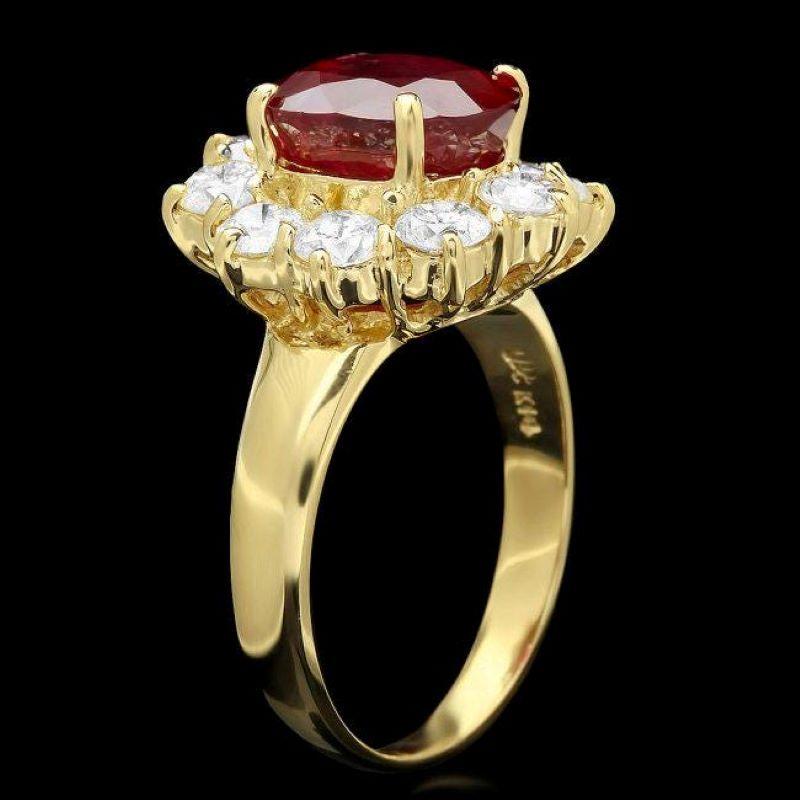 6.30 Carats Impressive Red Ruby and Natural Diamond 14K Yellow Gold Ring

Total Red Ruby Weight is: Approx. 4.60 Carats

Ruby Measures: Approx. 10.00 x 8.00mm

Ruby treatment: Fracture Filling

Natural Round Diamonds Weight: Approx. 1.70 Carats