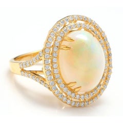 6,30 carati di opale etiope naturale e impressionante e anello con diamante in oro giallo massiccio 14 carati