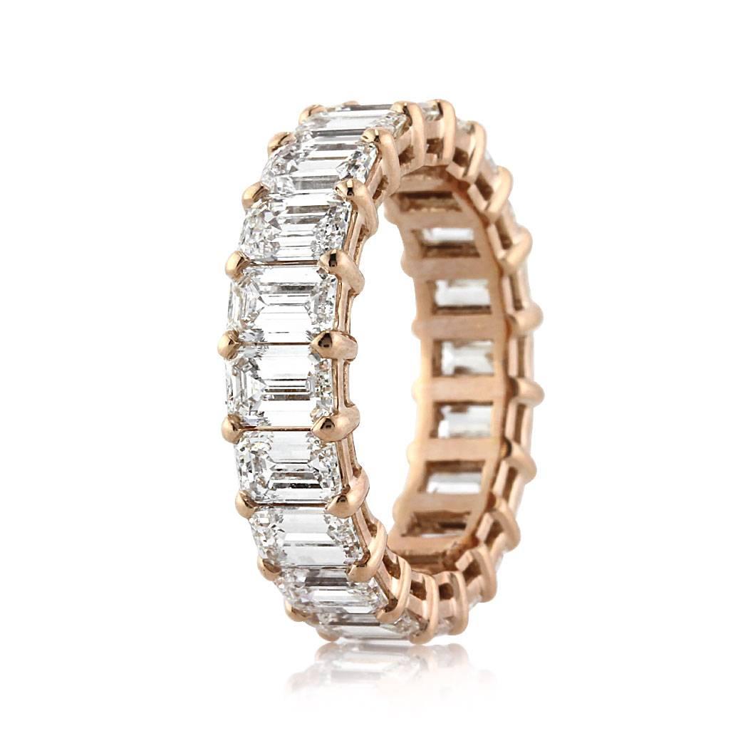 Handcrafted in 18k rose gold, this stunning diamond eternity band showcases 6.30ct of emerald cut diamonds graded at E-F, VVS2-VS1. All eternity bands are shown in a size 6.5. We custom craft each eternity band and will create the same design for