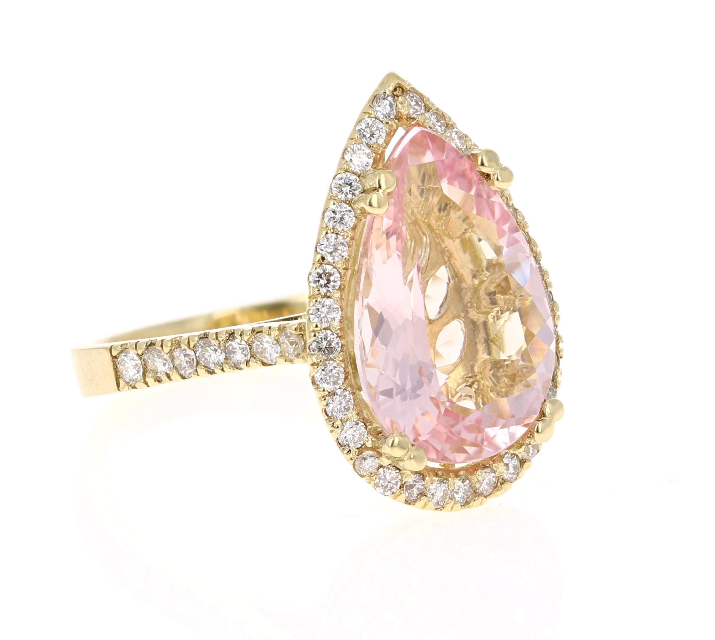 This Morganite ring has a gorgeous 5.59 Carat Pear Cut Pink Morganite and is surrounded by a halo of 49 Round Cut Diamonds that weigh 0.72 Carats.  The diamonds have a clarity and color of VS-H. The total carat weight of the ring is 6.31 Carats.
