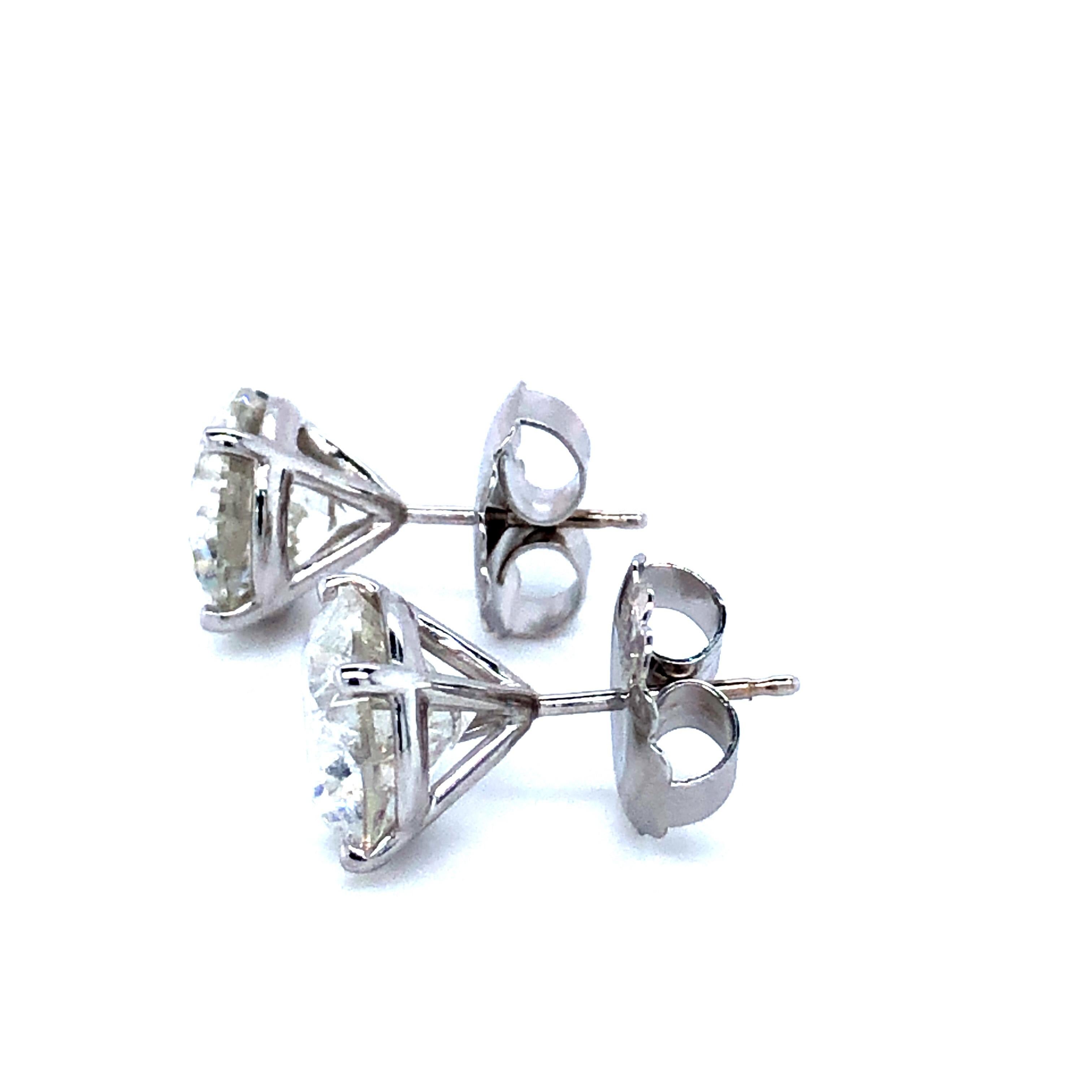 Brilliant Cut 6.31 Carat Diamond Studs Earrings 18 Karat White Gold
