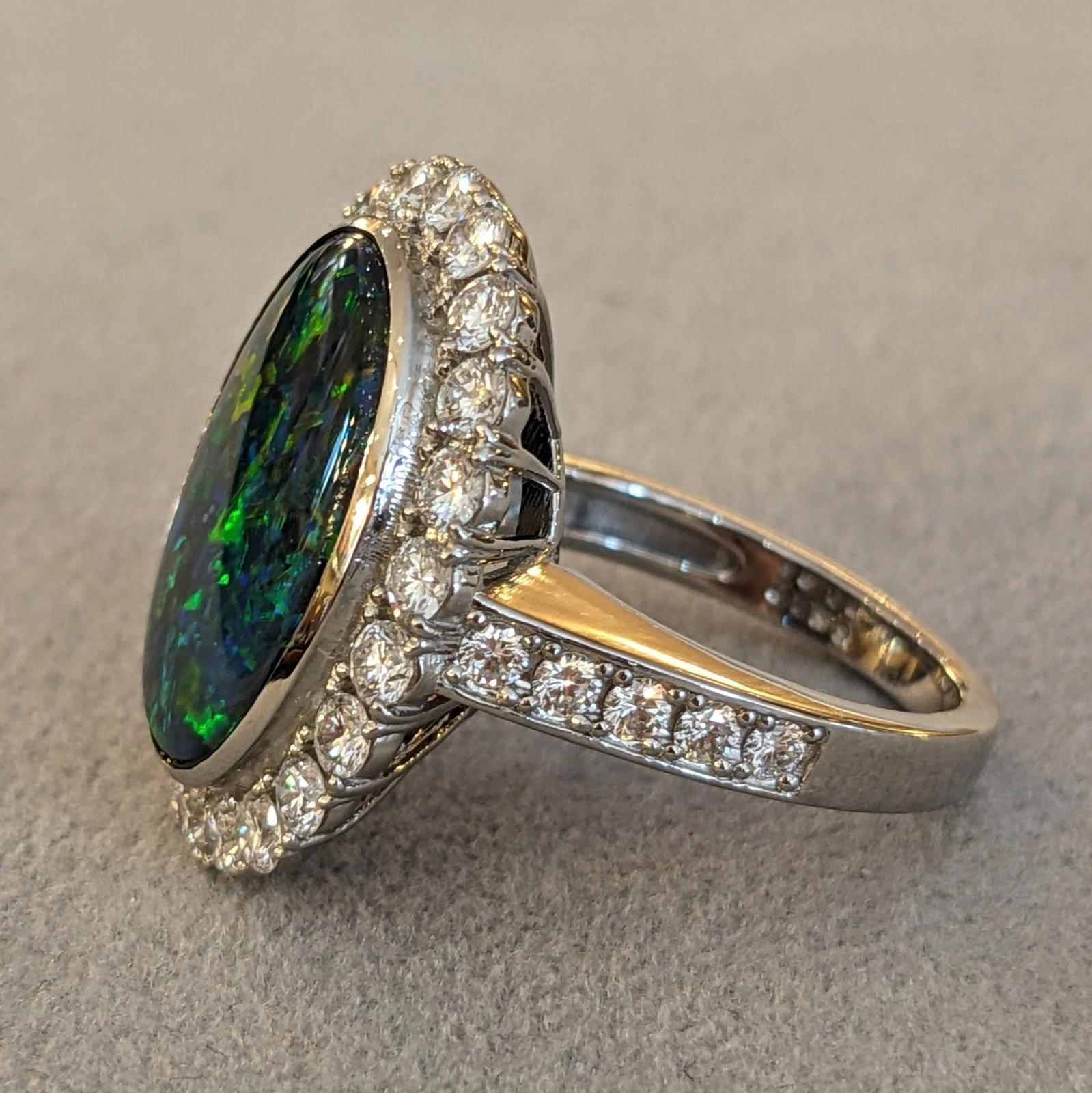 6.31 cts. Natural Black Opal and Diamond Halo Ring in Platinum Pour femmes en vente