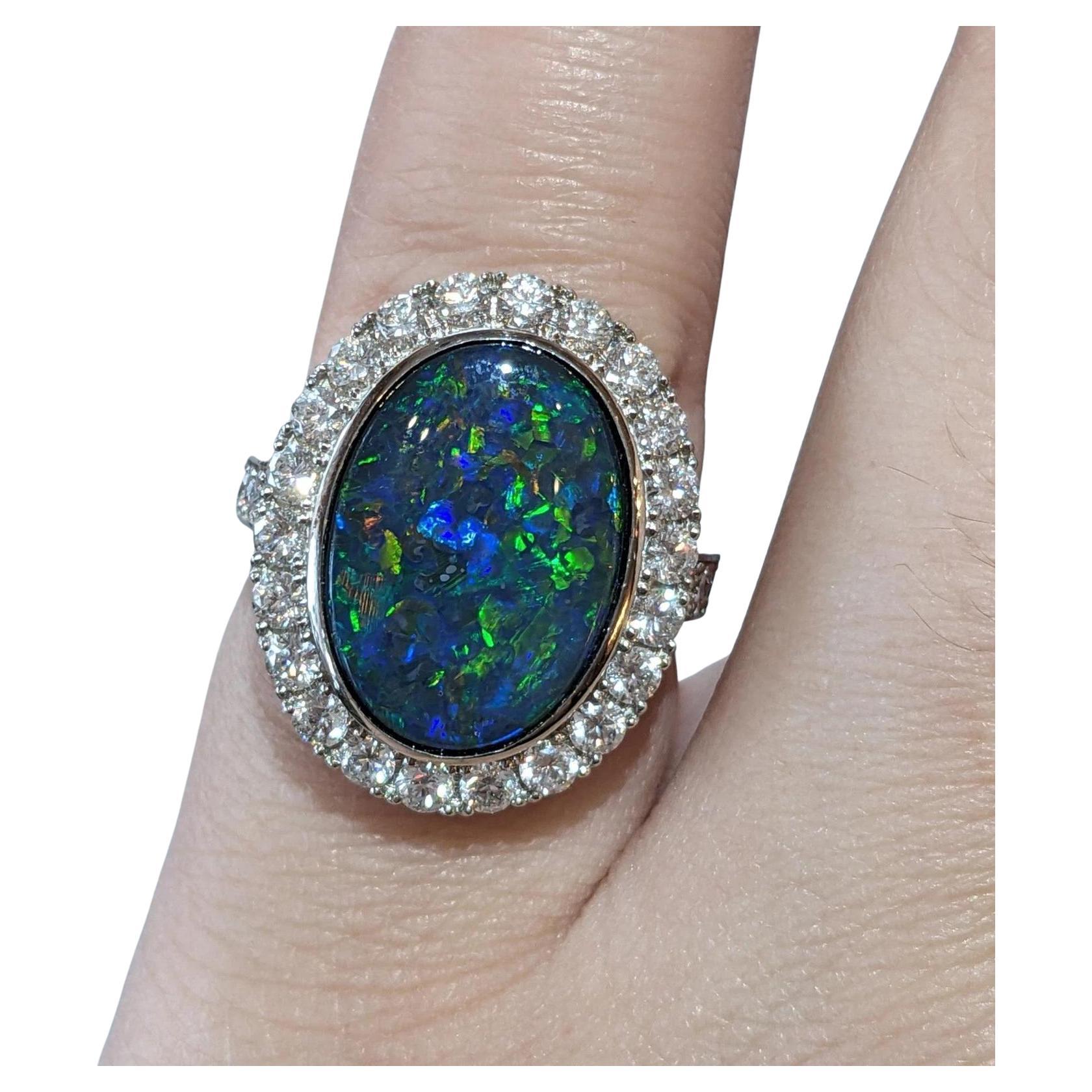 6.31 cts. Natural Black Opal and Diamond Halo Ring in Platinum en vente