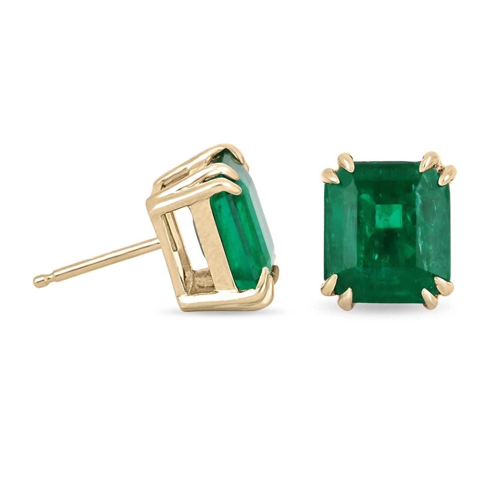 A remarkable, and extraordinary pair of fine-quality TOP-OF-THE-LINE AAA+ emerald earrings. This gorgeous set carries 6.31-carats, of two stunning emerald cut emeralds. The gemstones display, a rich and vivid, dark green color with a desirable