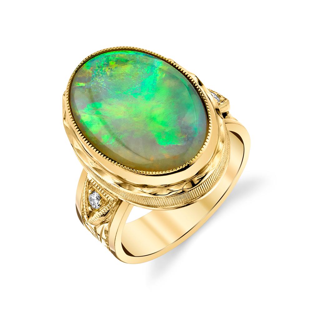 For those days you can't decide what color to wear, this opal ring has you covered! Our custom-designed, handmade ring features a beautiful 6.32 carat Australian opal that shows all the colors of the rainbow, with especially strong flashes of bright