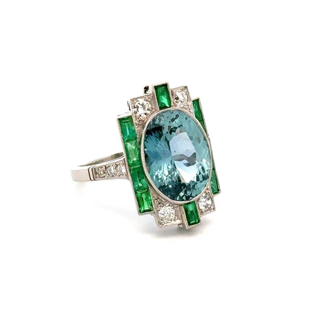 Simply Beautiful! Classic and finely detailed Burma No Heat Sapphire AGL and Diamond Platinum Statement Vintage Ring. Centering a securely Hand set 6.32 Carat NO HEAT Blue Sapphire AGL. Artfully surrounded by 1.13tcw Emeralds and 0.54tcw Old
