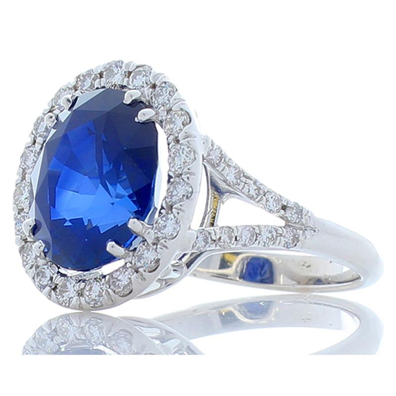 Contemporary 6.32 Carat Oval Blue Sapphire and Diamond Cocktail Ring in 18 Karat White Gold