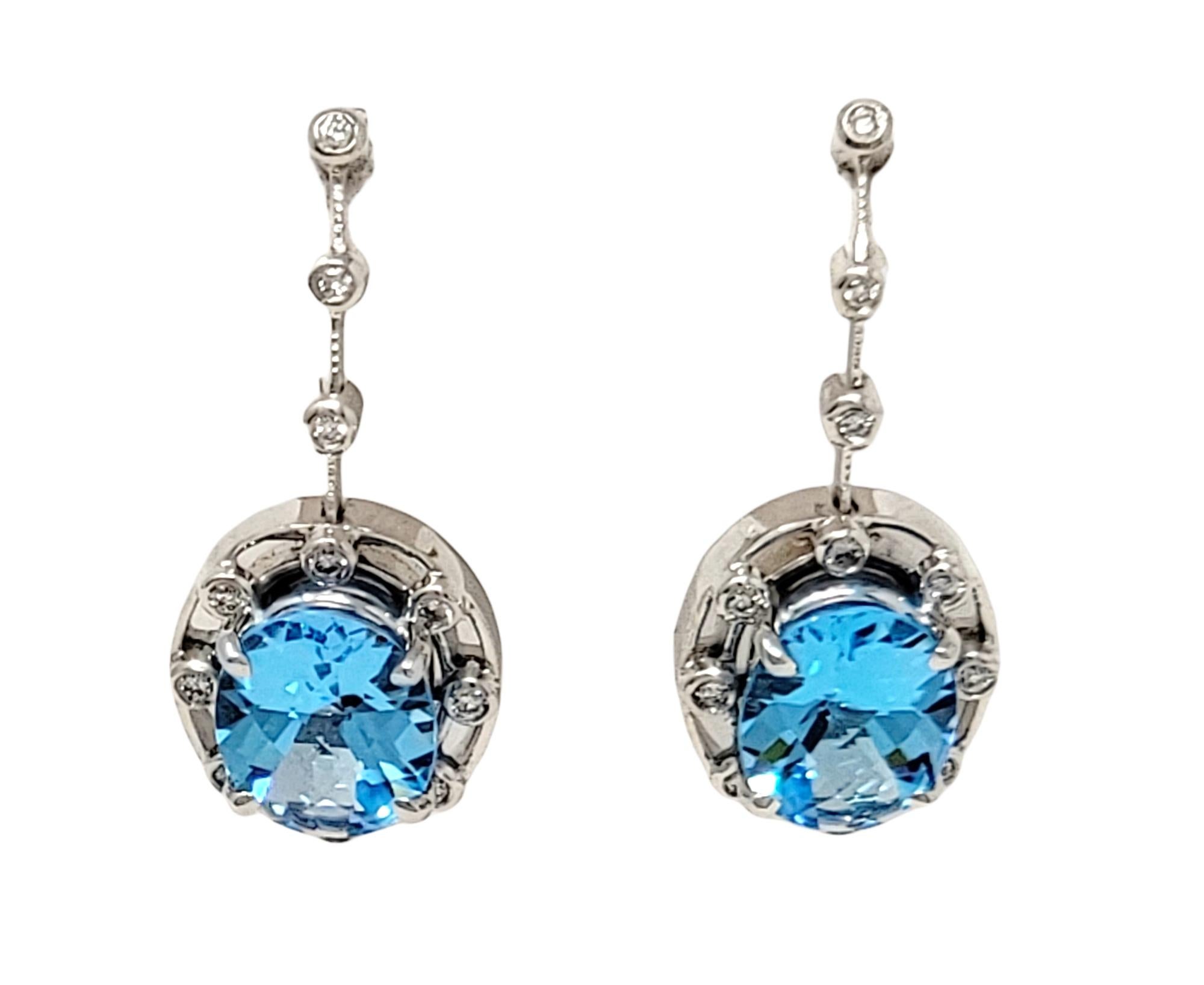 Contemporary 6.32 Carat Total Oval Cut Blue Topaz and Diamond Drop White Gold Dangle Earrings For Sale