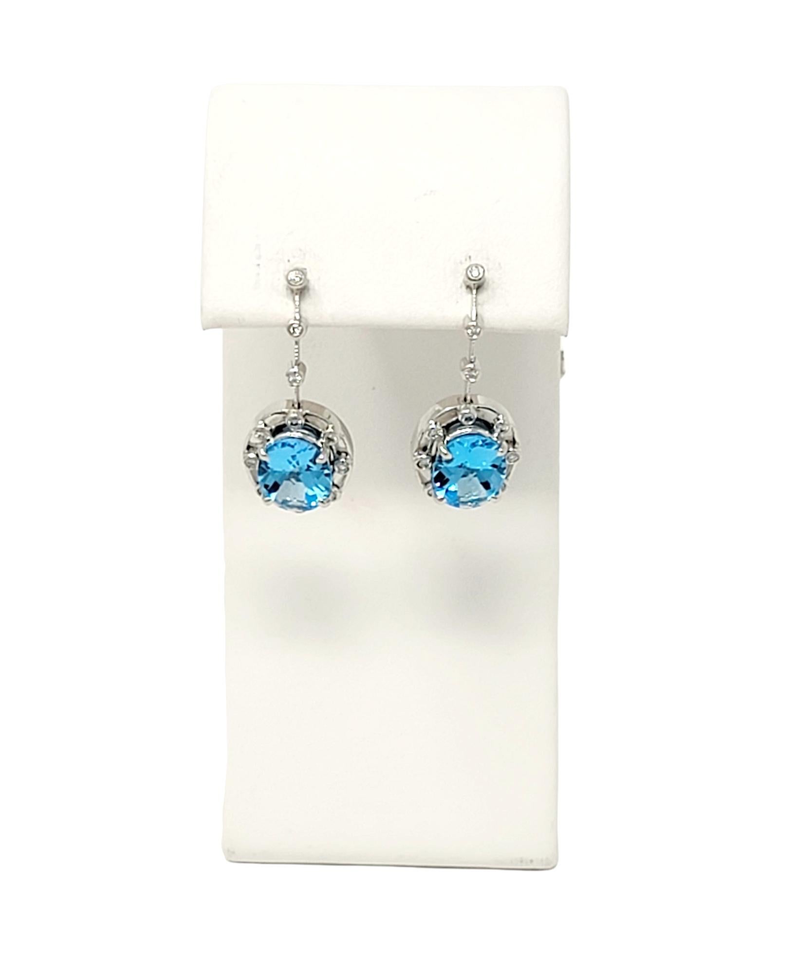 Boucles d'oreilles pendantes en or blanc avec topaze bleue de taille ovale de 6,32 carats et diamant. en vente 1