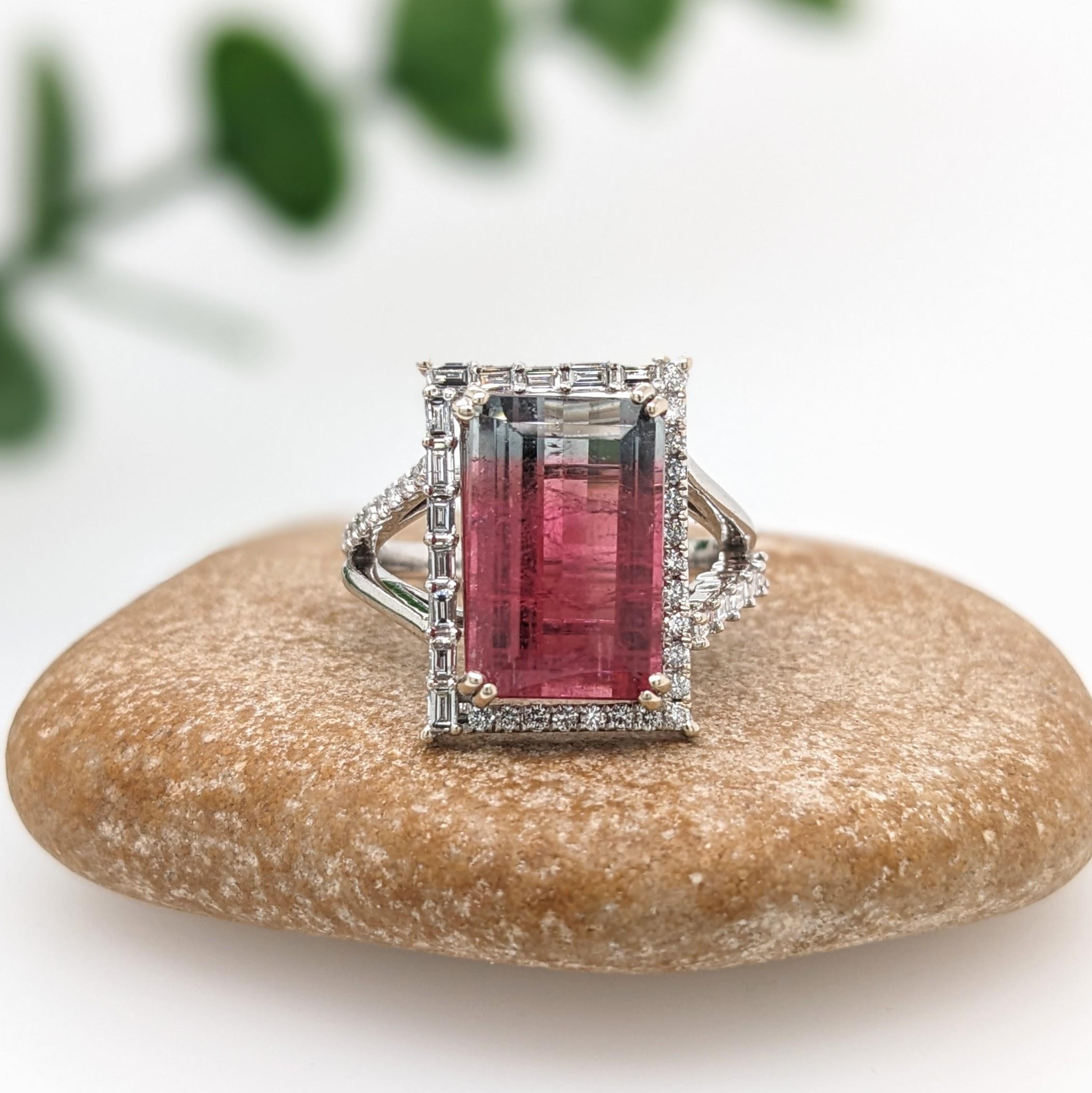 Gorgeous bi color Tourmaline with rich Pink and Gray colors highlighted by a halo of sparkling Diamonds. This ring makes a great statement piece, perfect for the holidays coming up!

Specifications:

Item Type: Ring
Center Stone: