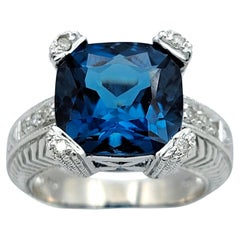 6.34 Carat Cushion Cut Blue Topaz Cocktail Ring with Diamonds in 14 Karat Gold